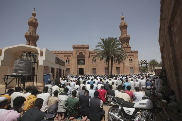 Men pray at the Grand Mosque, one of the city's landmarks, during Ramadan in Khartoum, Sudan, Friday March.  24, 2023. (AP Photo/Marwan Ali)
