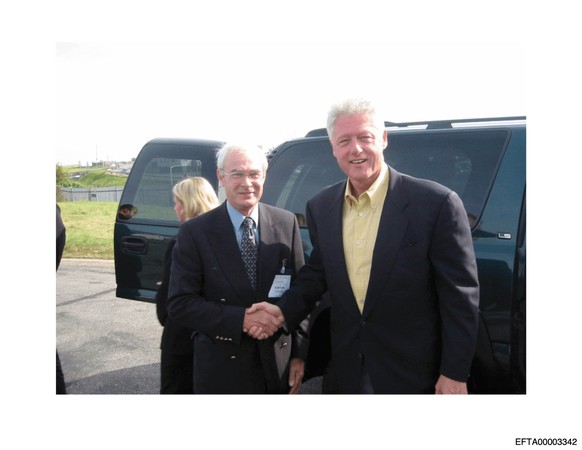 This undated photo released by the U.S. Department of Justice shows former President Bill Clinton, right, shaking hands with an unknown man. (U.S. Department of Justice via AP)
Justice Department Jeff ...