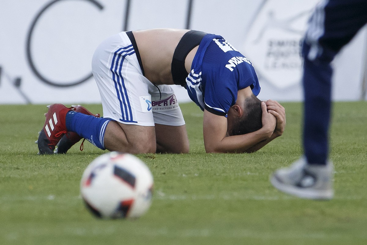 Lausanne's midfielder Olivier Custodio reacts after losing against Young Boys, during the Super League soccer match of Swiss Championship between FC Lausanne-Sport and BSC Young Boys, at the Stad ...