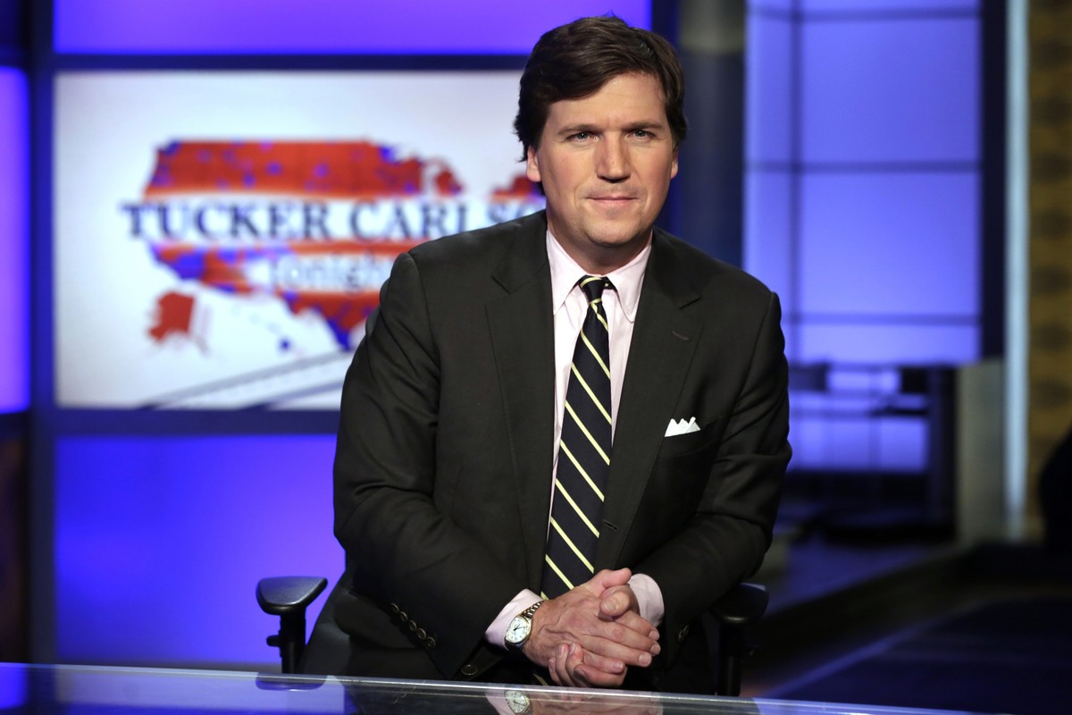 FILE - In this March 2, 2017 file photo, Tucker Carlson, host of "Tucker Carlson Tonight," poses for photos in a Fox News Channel studio, in New York. Tucker Carlson���s top writer has resig ...