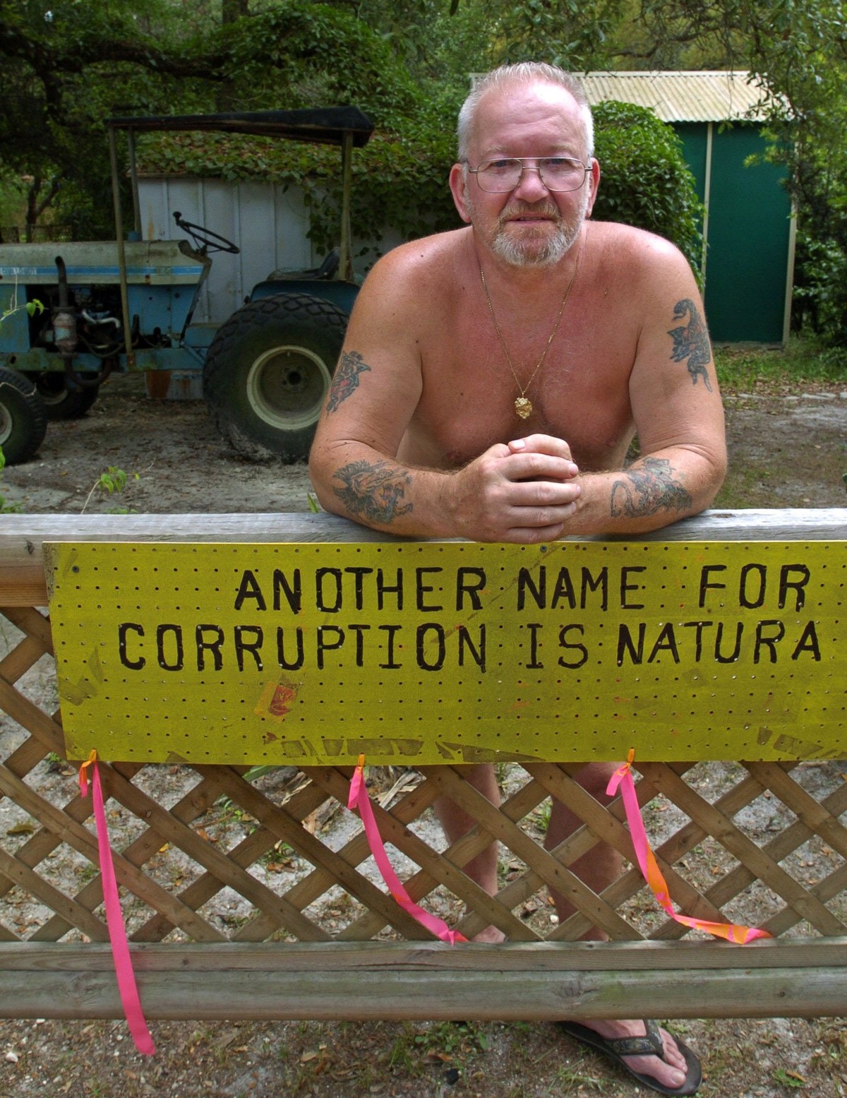 cq) Ray Cotton and some of his nudist neighbors in the Florida Naturist Park are battling plans by Christian nudist Bill Martin to build a fancy new resort called Natura Village on a couple hundred ac ...