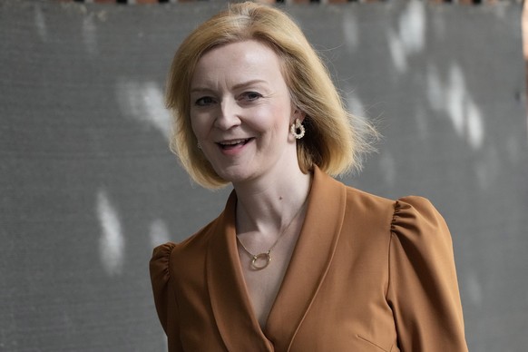 FILE - Britain&#039;s Secretary of State for Foreign, Commonwealth and Development Affairs, Liz Truss, leaves after a cabinet meeting at 10 Downing Street in London, Tuesday, July 19, 2022. Britain��� ...