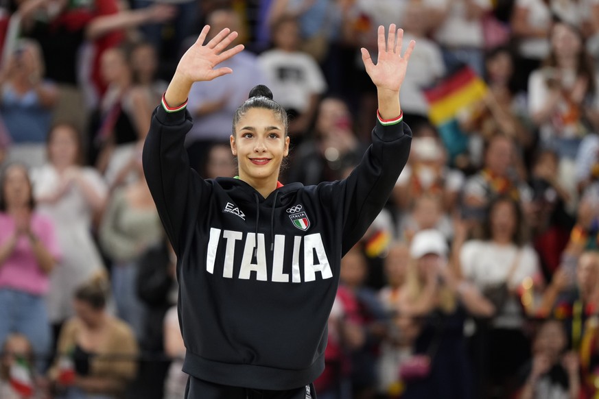 Bronze medalist Sofia Raffaeli, of Italy, waves to the crowd before getting her medal in the rhythmic gymnastics individual all-round competition at La Chapelle Arena at the 2024 Summer Olympics, Frid ...