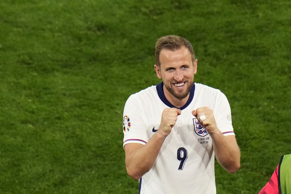 England&#039;s Harry Kane celebrates after winning a semifinal match against the Netherlands at the Euro 2024 soccer tournament in Dortmund, Germany, Wednesday, July 10, 2024. (AP Photo/Hassan Ammar)