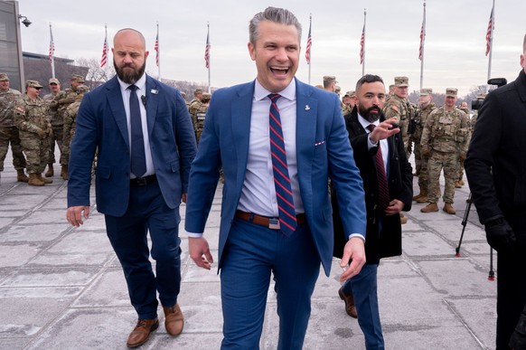 Defense Secretary Pete Hegseth leaves an oath of enlistment ceremony, Friday, Feb. 6, 2026, held on the base of the Washington Monument in Washington. (AP Photo/Kevin Wolf)
Pete Hegseth