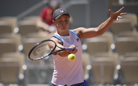 Australia&#039;s Ashleigh Barty plays a return to United States&#039;s Bernarda Pera during their first round match on day three of the French Open tennis tournament at Roland Garros in Paris, France, ...