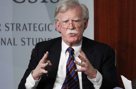 FILE - Former National security adviser John Bolton gestures while speaking at the Center for Strategic and International Studies (CSIS) in Washington, Sept. 30, 2019. The Justice Department says an I ...