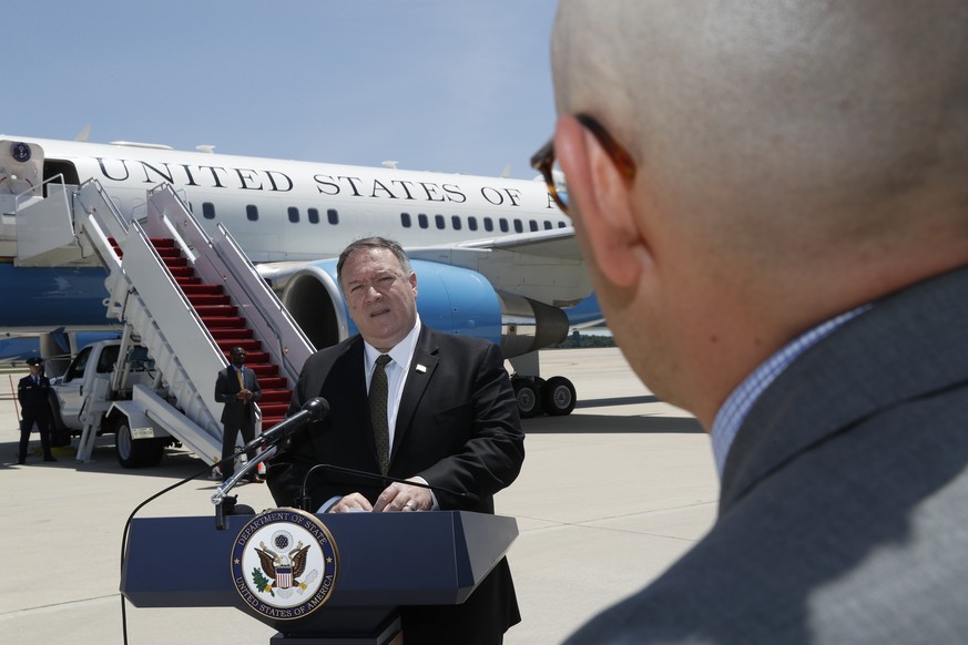 Secretary of State Mike Pompeo speaks to the media at Andrews Air Force Base, Md., Sunday, June 23, 2019, before boarding a plane headed to Jeddah, Saudi Arabia. (AP Photo/Jacquelyn Martin, Pool)