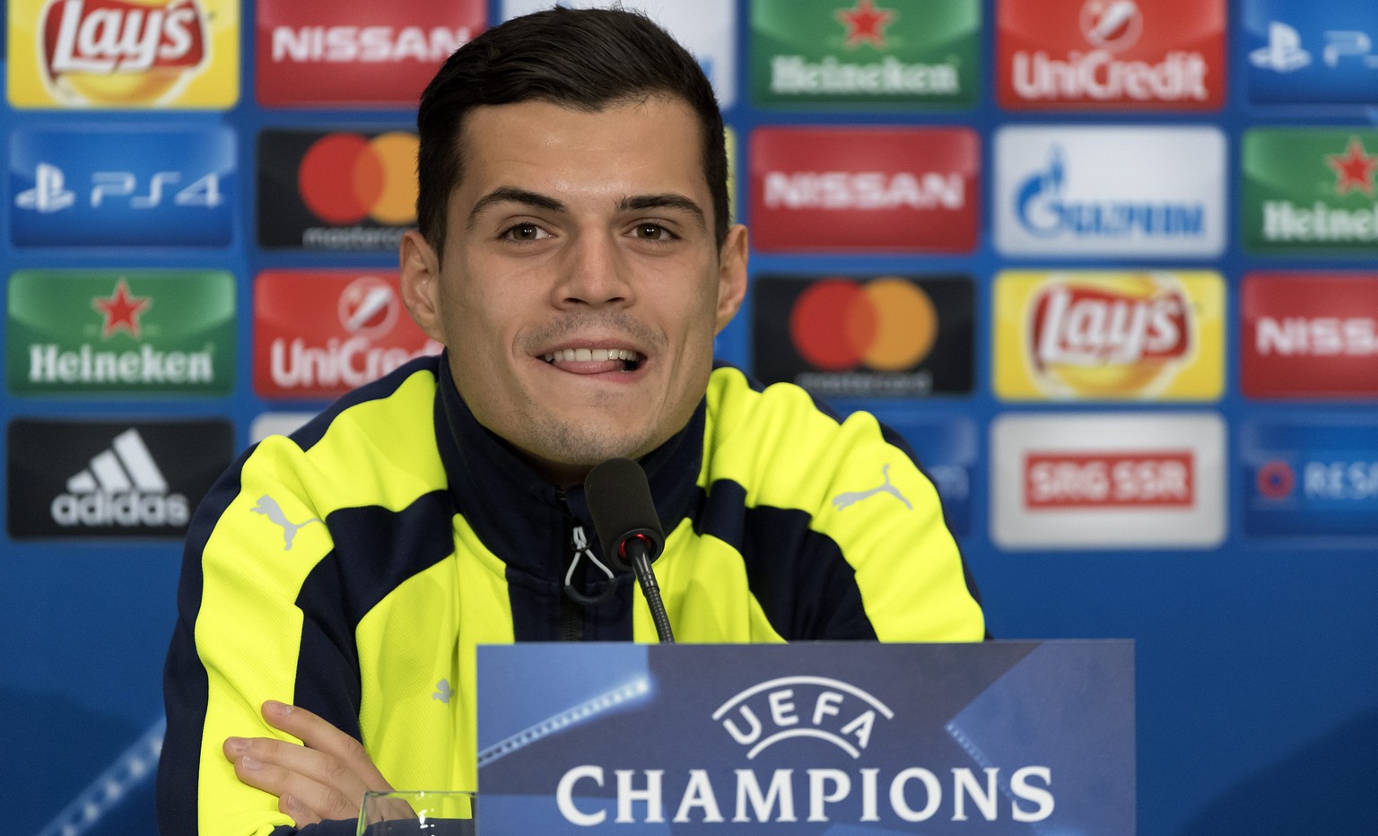 epa05661231 Arsenal&#039;s Granit Xhaka attends a press conference at the St. Jakob-Park stadium in Basel, Switzerland, 05 December 2016. Arsenal FC is scheduled to play against FC Basel 1893 in an UE ...