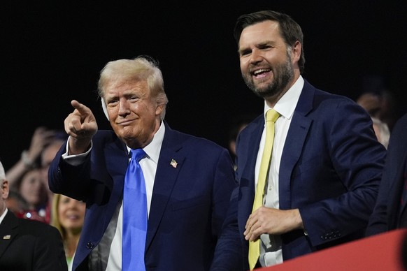Republican presidential candidate former President Donald Trump and Republican vice presidential candidate Sen. JD Vance, R-Ohio, attend the 2024 Republican National Convention at the Fiserv Forum, Tu ...