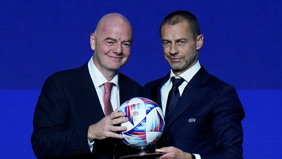 LISBON, PORTUGAL - APRIL 05: FIFA President Gianni Infantino and UEFA President Aleksander Ceferin pose for a photograph with a football during the 47th UEFA Ordinary Congress meeting on April 05, 202 ...