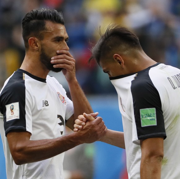 epa06830730 Oscar Duarte (R) and Giancarlo Gonzalez of Costa Rica react after the FIFA World Cup 2018 group E preliminary round soccer match between Brazil and Costa Rica in St.Petersburg, Russia, 22  ...