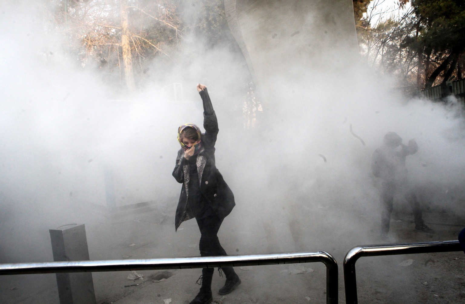 epa06412625 (FILE) - Iranian students clash with riot police during an anti-government protests around the Tehran University in Tehran, Iran, 30 December 2017. Media reported on 01 January 2018 that t ...