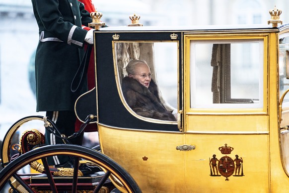 epa08099598 Danish Queen Margrethe II is escorted by the Gardehusar Regiment&#039;s Horseskort in the gold carriage from Christian IX&#039;s Palace, Amalienborg to Christiansborg Palace in Copenhagen, ...