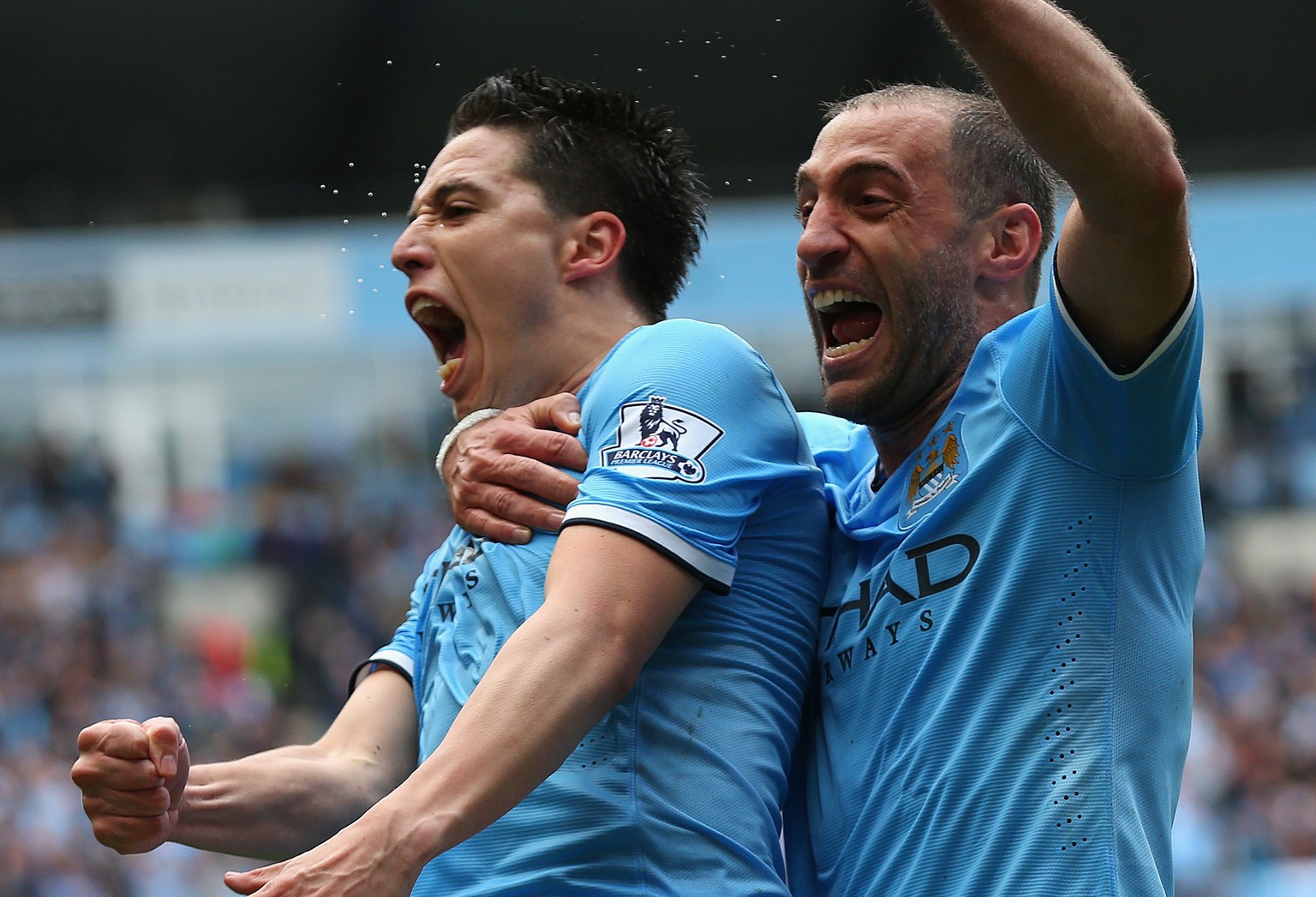 Nasri und Zabaleta schreien ihre Freude in die Welt hinaus.