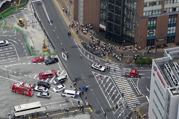 This aerial photo shows the scene of gunshots in Nara, western Japan Friday, July 8, 2022. Japan