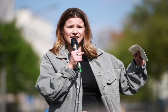 epa12911467 German climate activist Luisa Neubauer delivers a speech during a Fridays For Future (FFF) rally outside the Christian Democratic Union (CDU) party's headquarters, in Berlin, Germany, ...