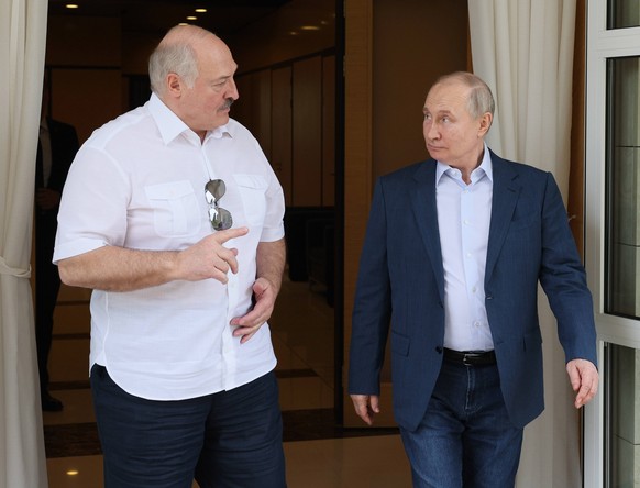 epa10681319 Russian President Vladimir Putin (R) and Belarusian President Alexander Lukashenko during their meeting at the Bocharov Ruchei residence in the resort town of Sochi, Russia, June 09, 2023. P ...