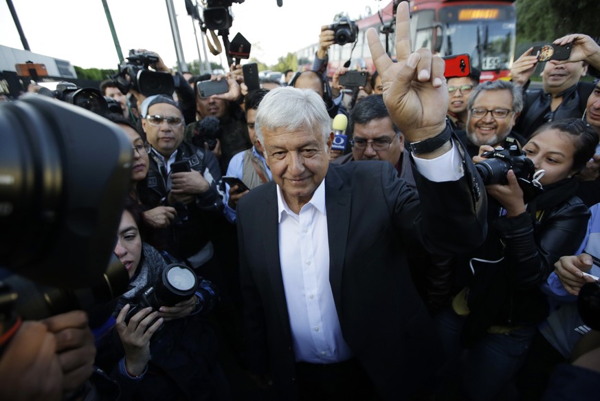 Presidential candidate Andres Manuel Lopez Obrador, of the MORENA party, arrives to a polling station during general election in Mexico City, Mexico, Sunday, July 1, 2018. (AP Photo/Moises Castillo)