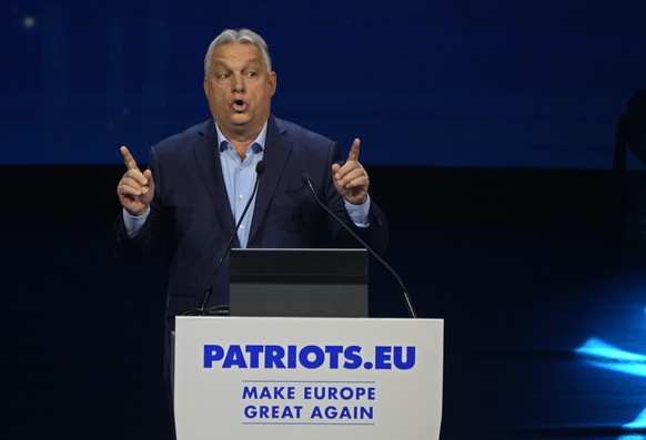 Hungarian Prime Minister Viktor Orban makes a speech during the far-right Patriots for Europe summit in Madrid, Spain, Saturday, Feb. 8, 2025. (AP Photo/Paul White)