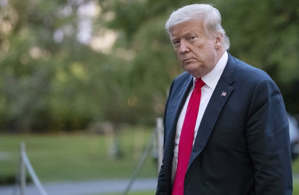 FILE- In this Thursday, June 25, 2020, file photo, President Donald Trump walks on the South Lawn after arriving on Marine One at the White House in Washington. The president&#039;s brother Robert Tru ...