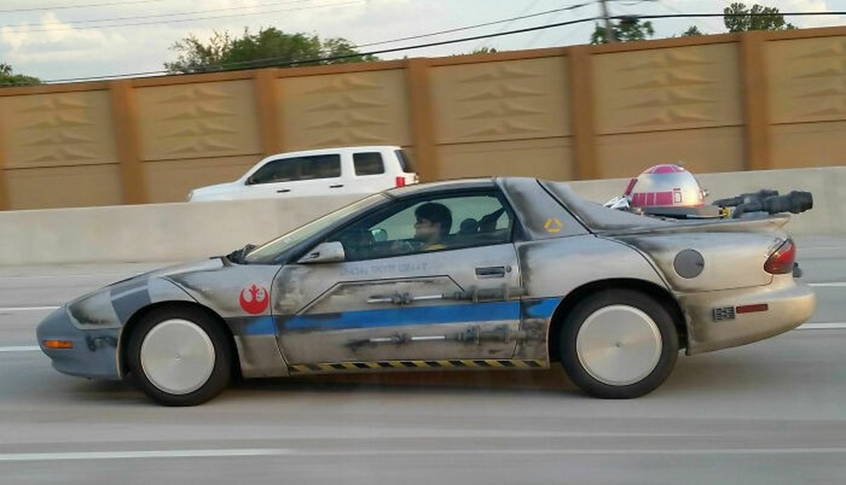 Star-Wars-Camaro! 
https://www.reddit.com/r/mildlyinteresting/comments/3ncyqr/very_well_done_car_mod_with_star_wars_theme/