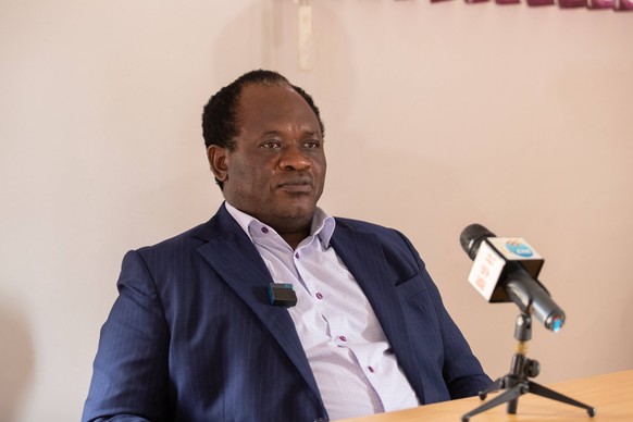 230329 -- LUSAKA, March 29, 2023 -- Brian Mundubile, leader of the opposition in the Zambian parliament, speaks during an interview with Xinhua in Lusaka, Zambia, March 27, 2023. TO GO WITH Experts ch ...