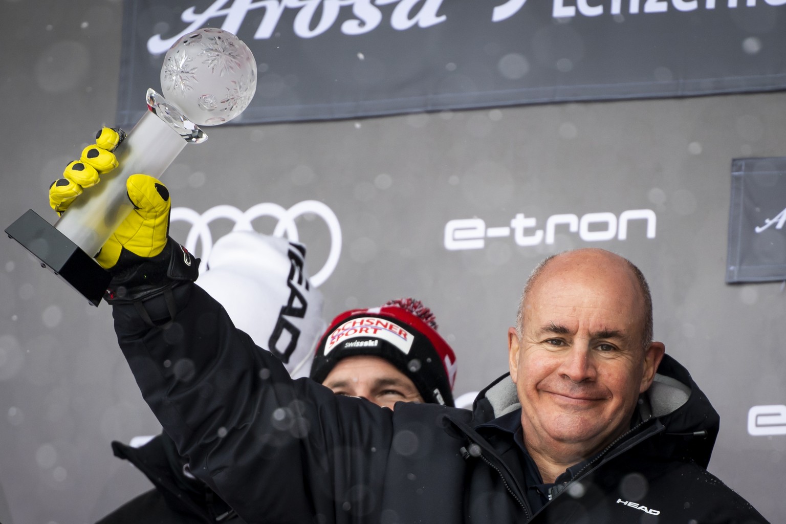 Johan Eliasch, Chairman of the Management Board of the HEAD group celebrates on the podium at the FIS Alpine Skiing World Cup finals, in Parpan-Lenzerheide, Switzerland, Sunday, March 21, 2021. (KEYST ...