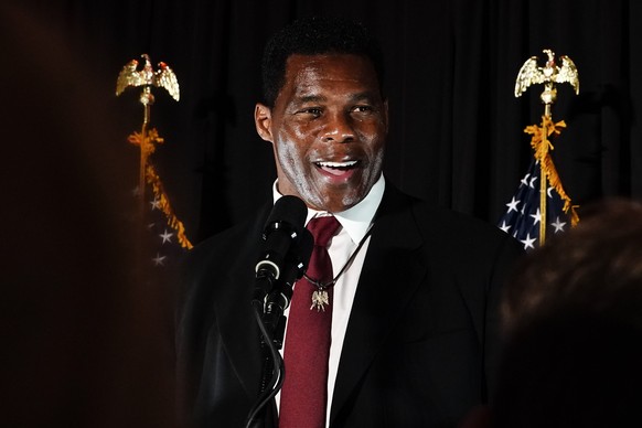 Republican U.S. Senate candidate Herschel Walker speaks during an election night watch party on Tuesday, Nov. 8, 2022, in Atlanta. Walker is running against Democratic Sen. Raphael Warnock. (AP Photo/ ...