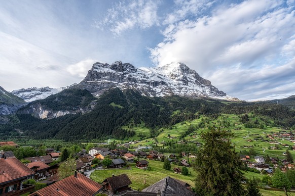 Eiger Mountain View Eiger Mountain viewed from Grindelwald during sunrise hours. Famous landmark in Grindelwald, Switzerland Copyright: xZoonar.com/InsungxChoix 21813364