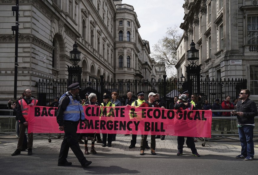 Extinction Rebellion demonstrators outside Downing Street on the last day of the environmental action group&#039;s four days of action called &quot;The Big One&quot;, in London, Monday April 24, 2023. ...