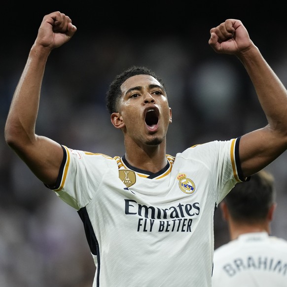 Real Madrid&#039;s Jude Bellingham celebrates at the end of Spanish La Liga soccer match between Real Madrid and Getafe at the Santiago Bernabeu stadium in Madrid, Spain, Saturday, Sept. 2, 2023. Real ...