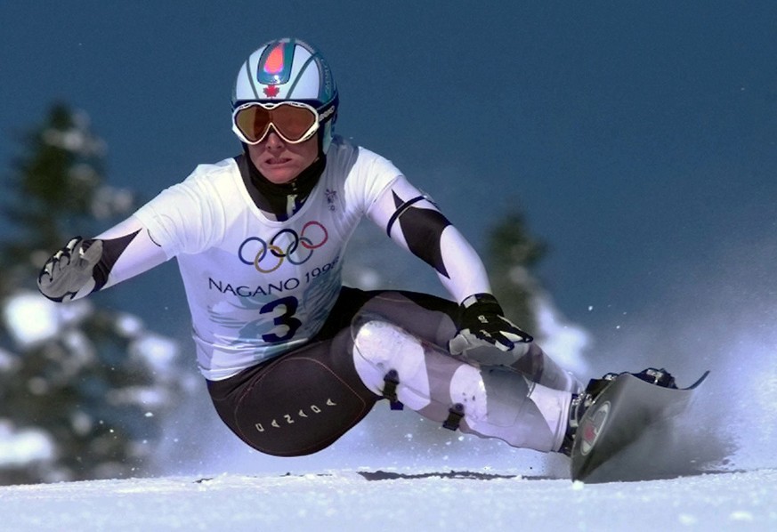 Canadian gold medalist Ross Rebagliati of Men&#039;s Giant Slalom snowboarding competition is seen in action on February 8, 1998 in Yamanouchi, Japan. Rabagliati tested positive for marijuana after hi ...