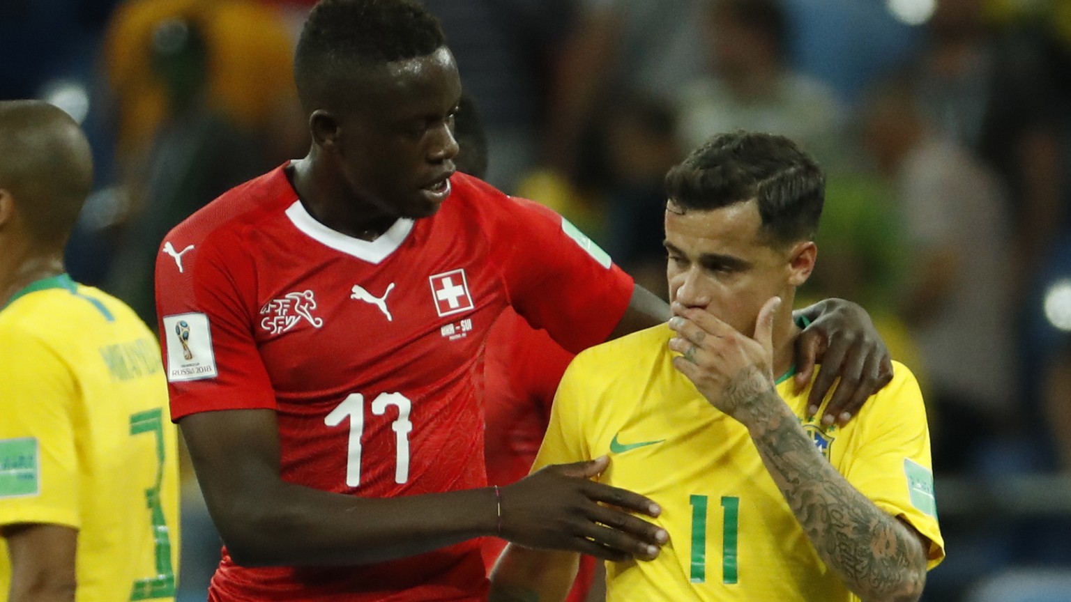 epa06817100 Philippe Coutinho (R) of Brazil and Denis Zakaria of Switzerland react after the FIFA World Cup 2018 group E preliminary round soccer match between Brazil and Switzerland in Rostov-On-Don, ...