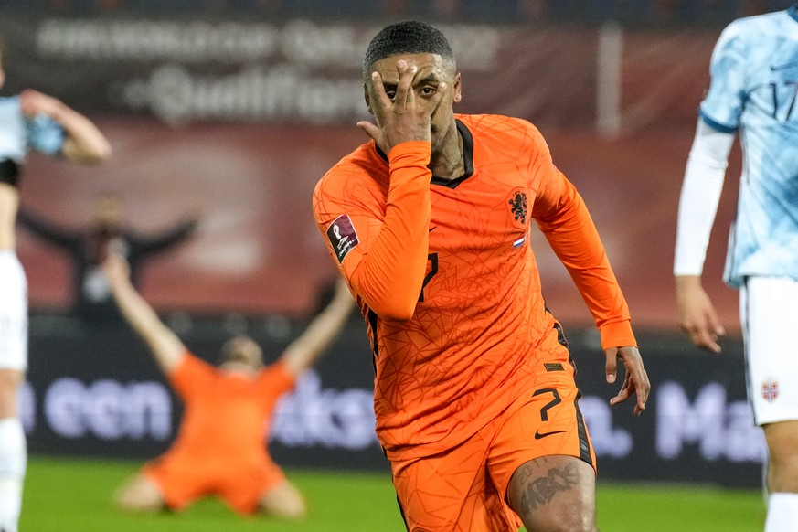 Netherlands&#039; Steven Bergwijn reacts after scoring his team&#039;s first goal during the World Cup 2022 group G qualifying soccer match between the Netherlands and Norway at De Kuip stadium in Rot ...