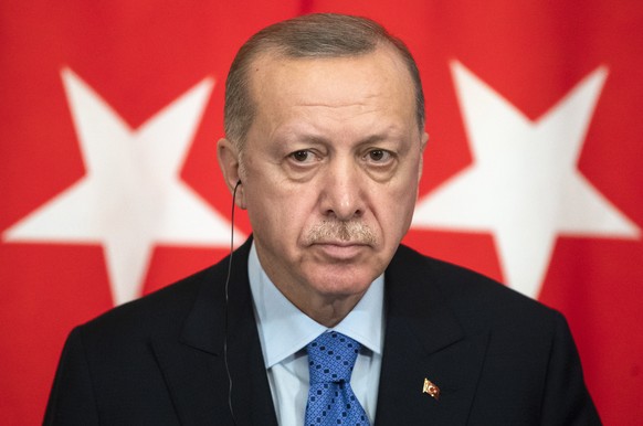 epa08272825 Turkish President Recep Tayyip Erdogan listens during a news conference in the Kremlin in Moscow, Russia, 05 March 2020. Russian President Vladimir Putin and his Turkish counterpart, Recep ...