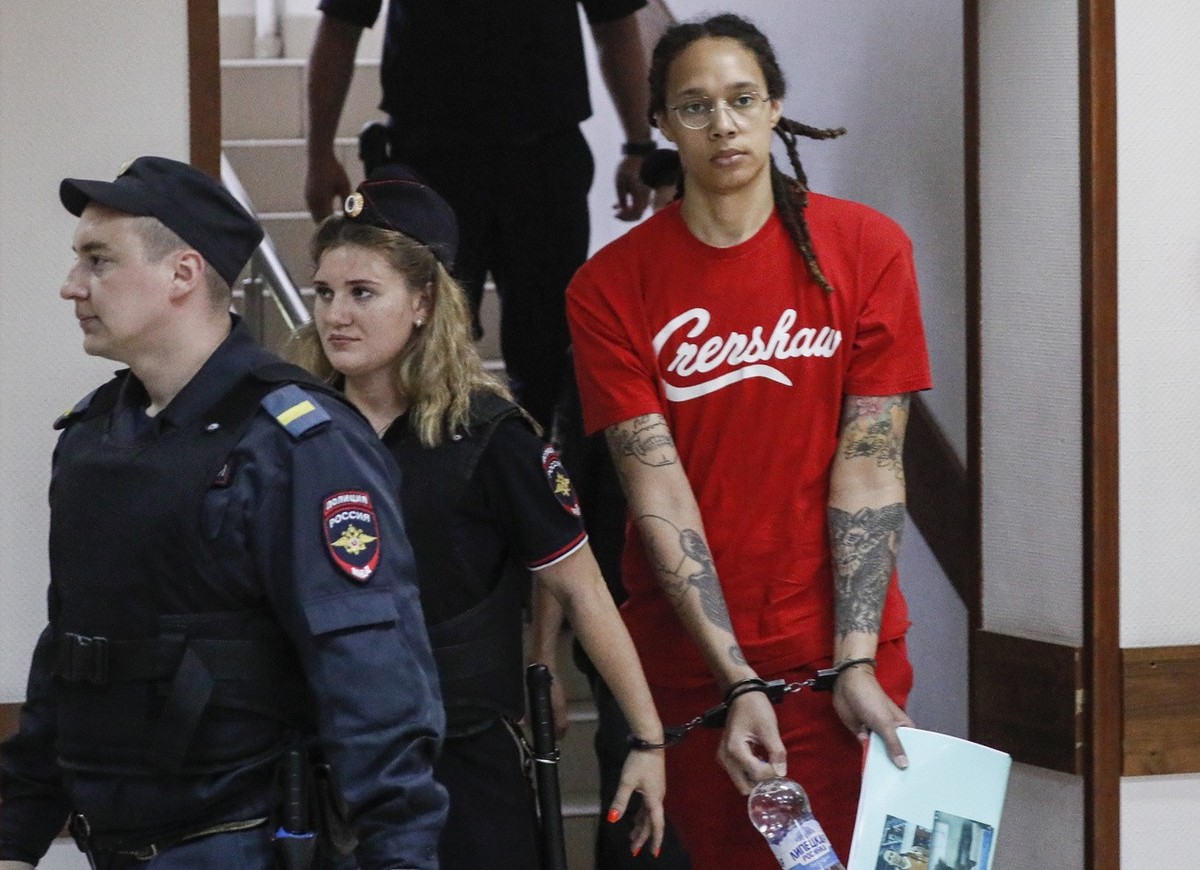 Two-time Olympic gold medalist and WNBA's Phoenix Mercury Brittney Griner (R) is escorted to a courtroom for a hearing, in Khimki City Court, outside Moscow, Russia, 07 July 2022.