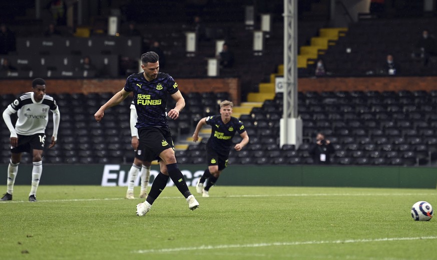 Newcastle United&#039;s Fabian Schar scores the second goal of the game during their English Premier League soccer match against Fulham at Craven Cottage, London, Sunday, May 23, 2021. (Glyn Kirk/Pool ...