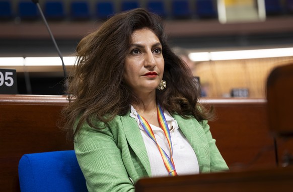 epa11435991 Sibel Arslan, Member of Swiss Delegation to the Parliamentary Assembly of the Council of Europe, follows the debates in the Palace of Europe, during the third part of the 2024 Ordinary Ses ...