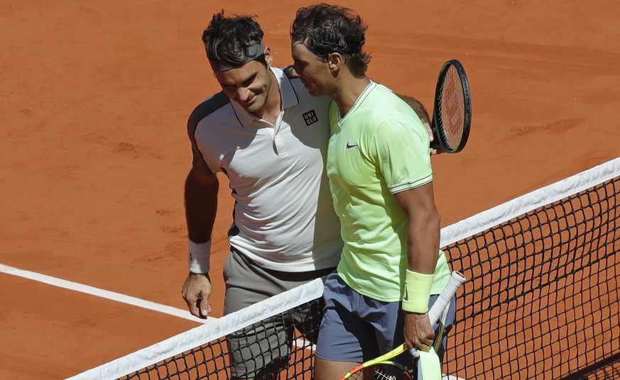 Spain&#039;s Rafael Nadal, right, is congratulated by Switzerland&#039;s Roger Federer after winning their semifinal match of the French Open tennis tournament at the Roland Garros stadium in Paris, F ...