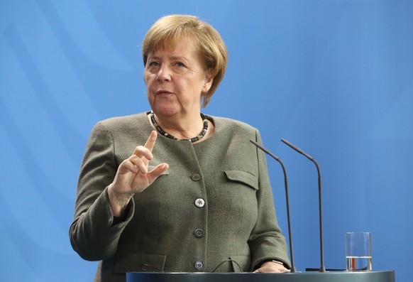 epa07306103 German Chancellor Angela Merkel speaks at the German federal Chancellery in Berlin, Germany, 21 January 2019. The German and Uzbek heads of state met to discuss the deepening of investment ...