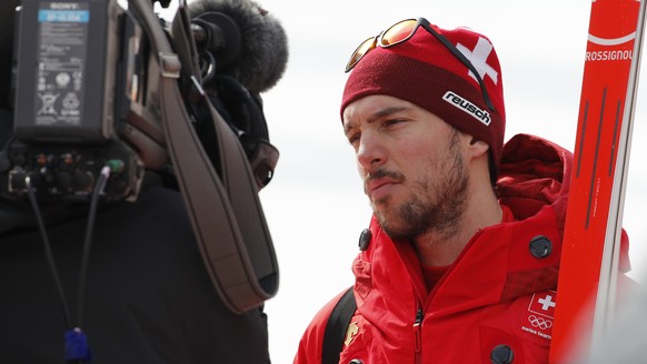 Switzerland&#039;s Carlo Janka is interviewed in the finish area after completing men&#039;s downhill training at the 2018 Winter Olympics in Jeongseon, South Korea, Saturday, Feb. 10, 2018. (AP Photo ...