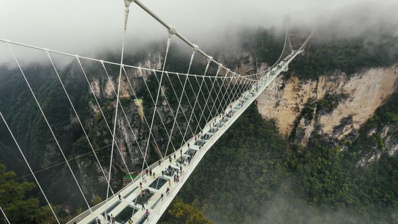The world's tallest and longest glass bridge as of 2016 in Zhangjiajie, CHunan, China