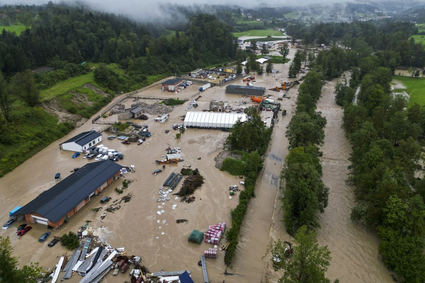 A view of flooded business district near town of Kamnik, Slovenia, Friday, Aug. 4, 2023. Slovenia has faced the worst-ever natural disaster in its history, Prime Minister Robert Golob said Saturday, a ...