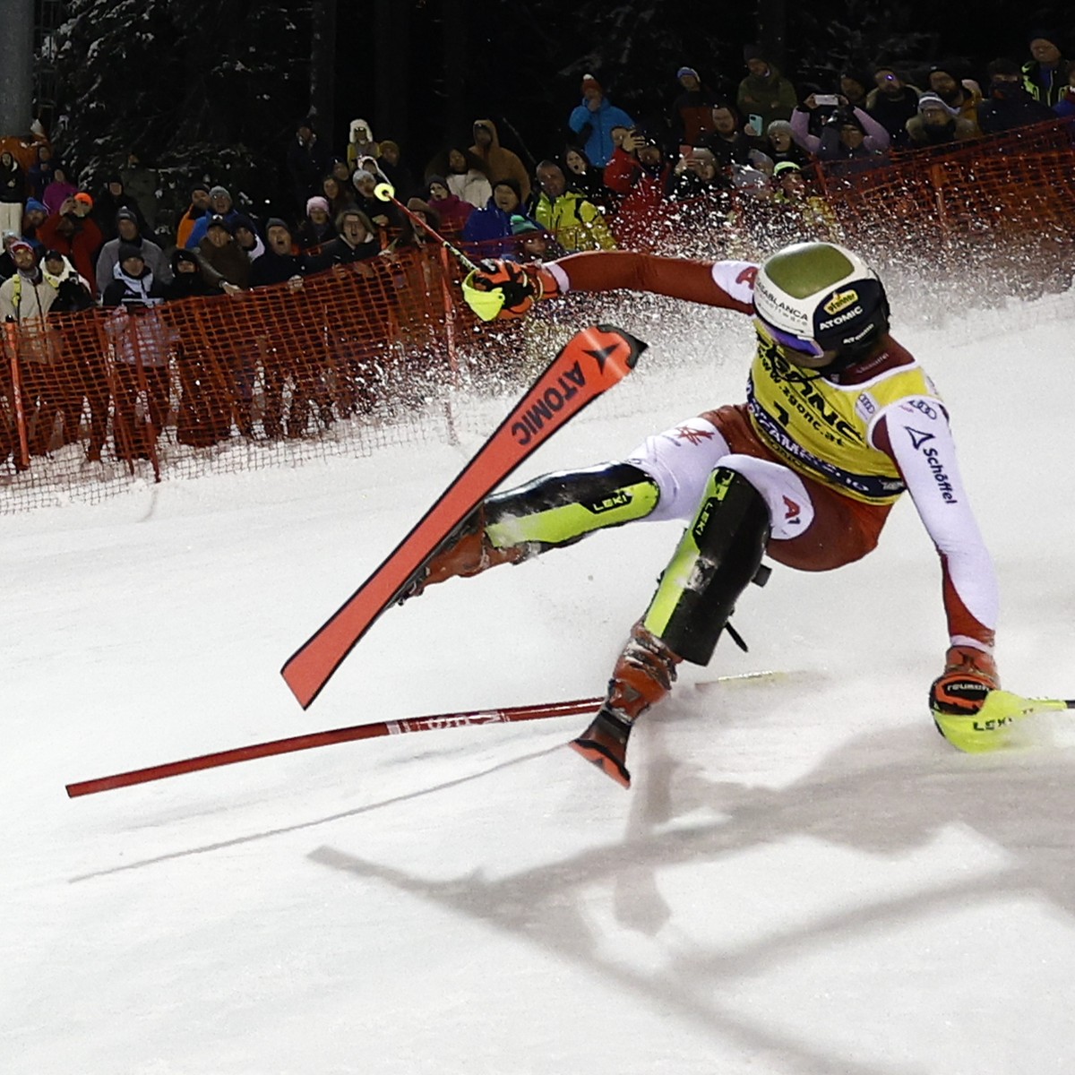 Austria's Manuel Feller falls down during an alpine ski, men's World Cup slalom in Madonna di Campiglio, Italy, Wednesday, Jan.8, 2025. (AP Photo/Gabriele Facciotti)