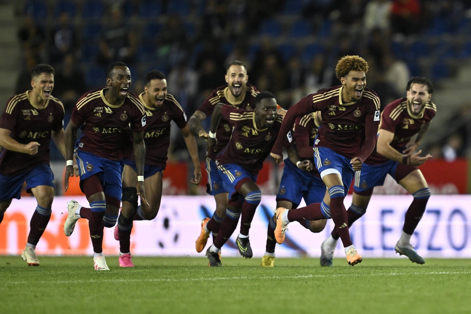 Servette s players celebrate after winning a soccer game between Belgian KRC Genk and Swiss Servette FC, Wednesday 02 August 2023 in Genk, the first leg of the second qualifying round for the UEFA Cha ...