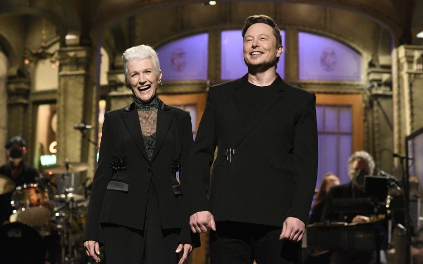 This image released by NBC shows host Elon Musk with his mother Maye as he delivers his opening monologue on &quot;Saturday Night Live&quot; in New York on May 8, 2021. (Will Heath/NBC via AP)