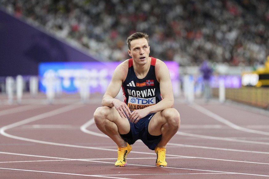 Norway&#039;s Karsten Warholm reacts after finishing 5th in the men&#039;s 400 meters hurdles final at the World Athletics Championships in Tokyo, Friday, Sept. 19, 2025. (AP Photo/Petr David Josek)
J ...
