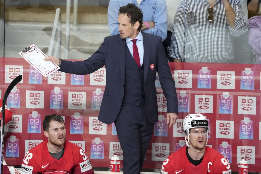 Head coach Patrick Fischer of Switzerland reacts during the group B match between Latvia and Switzerland at the ice hockey world championship in Riga, Latvia, Tuesday, May 23, 2023. (AP Photo/Roman Ko ...