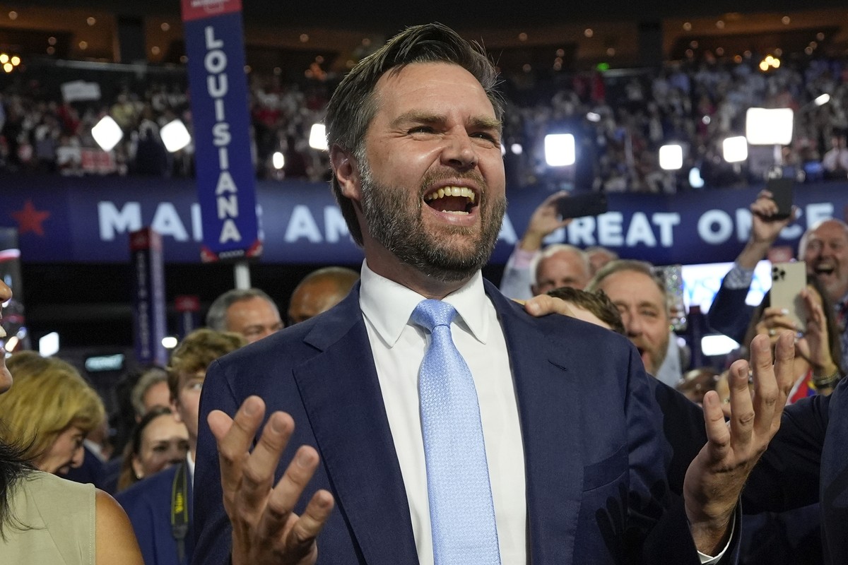 Republican vice presidential candidate Sen. JD Vance, R-Ohio, arrives on the floor during the first day of the 2024 Republican National Convention at the Fiserv Forum, Monday, July 15, 2024, in Milwau ...